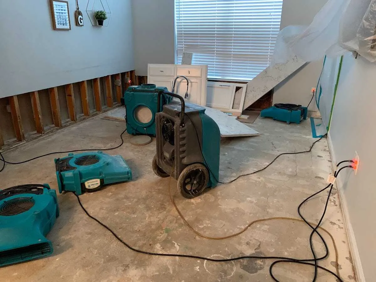 Dehumidifier in flood-cut room for Water Damage Restoration in Petal